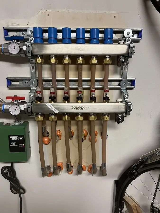 Plumber performing Water Heater Repair at a residential property in North East